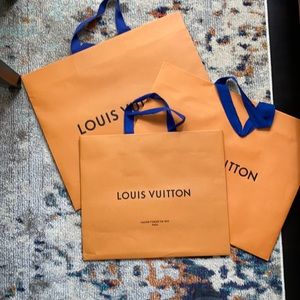 Louie Vuitton paper bags with blue handle